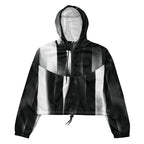 Black and white striped jacket with a hood on a white background