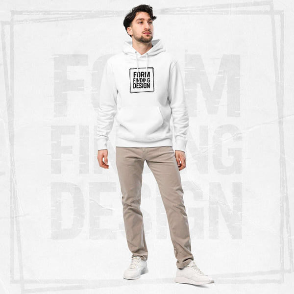 Male model wearing FormFD Men’s Signature Hoodie (FFD-05) in white with black square “FORM FINDING DESIGN” print, styled with beige chinos and white trainers, clean studio backdrop.