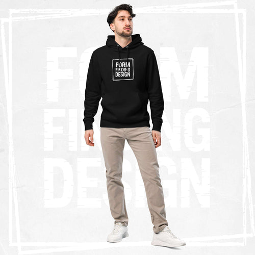 Male model wearing FormFD Men’s Signature Hoodie (FFD-06) in black with white square “FORM FINDING DESIGN” print, styled with beige chinos and white trainers, clean studio backdrop.