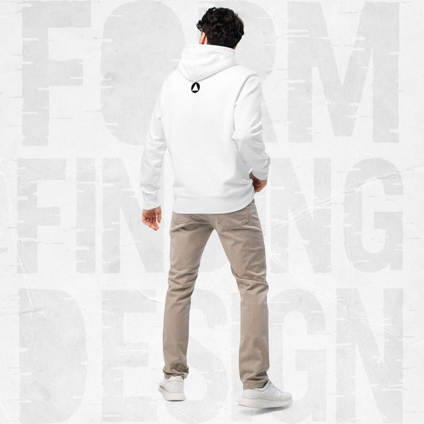 Back view on model in Form Finding Design Men’s Signature Hoodie (FFD-07), white—minimal back with small black circular emblem below the hood, paired with beige chinos and white trainers.