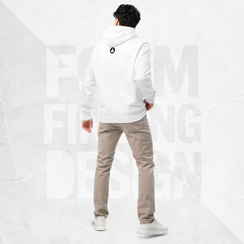 Back view on model in Form Finding Design Men’s Signature Hoodie (FFD-15), white—minimal back with small black circular emblem below the hood, paired with beige chinos and white trainers.