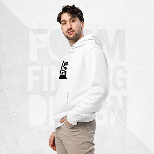 Three-quarter side portrait of male model in FormFD Men’s Signature Hoodie (FFD-15), white—hood drape, kangaroo pocket and partial chest logo visible, hand in pocket, beige chinos.