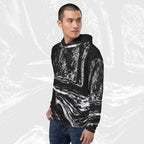 Man in a black stipple print hoodie no.04, three-quarter view, halftone image running across chest and sleeve.