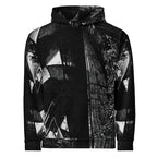 A black pullover hoodie featuring a high-contrast black and white abstract geometric print with a distressed texture, shown against a plain white background.