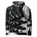 A long-sleeve pullover hoodie featuring an all-over abstract black and white print resembling tree bark, branches, and textured splatters, shown against a plain white background.