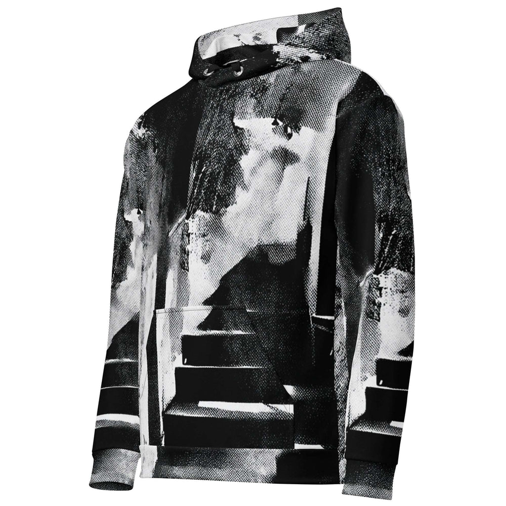 A black and white pullover hoodie featuring an abstract, high-contrast graphic print of stairs and smoke-like textures, shown on a plain white background.