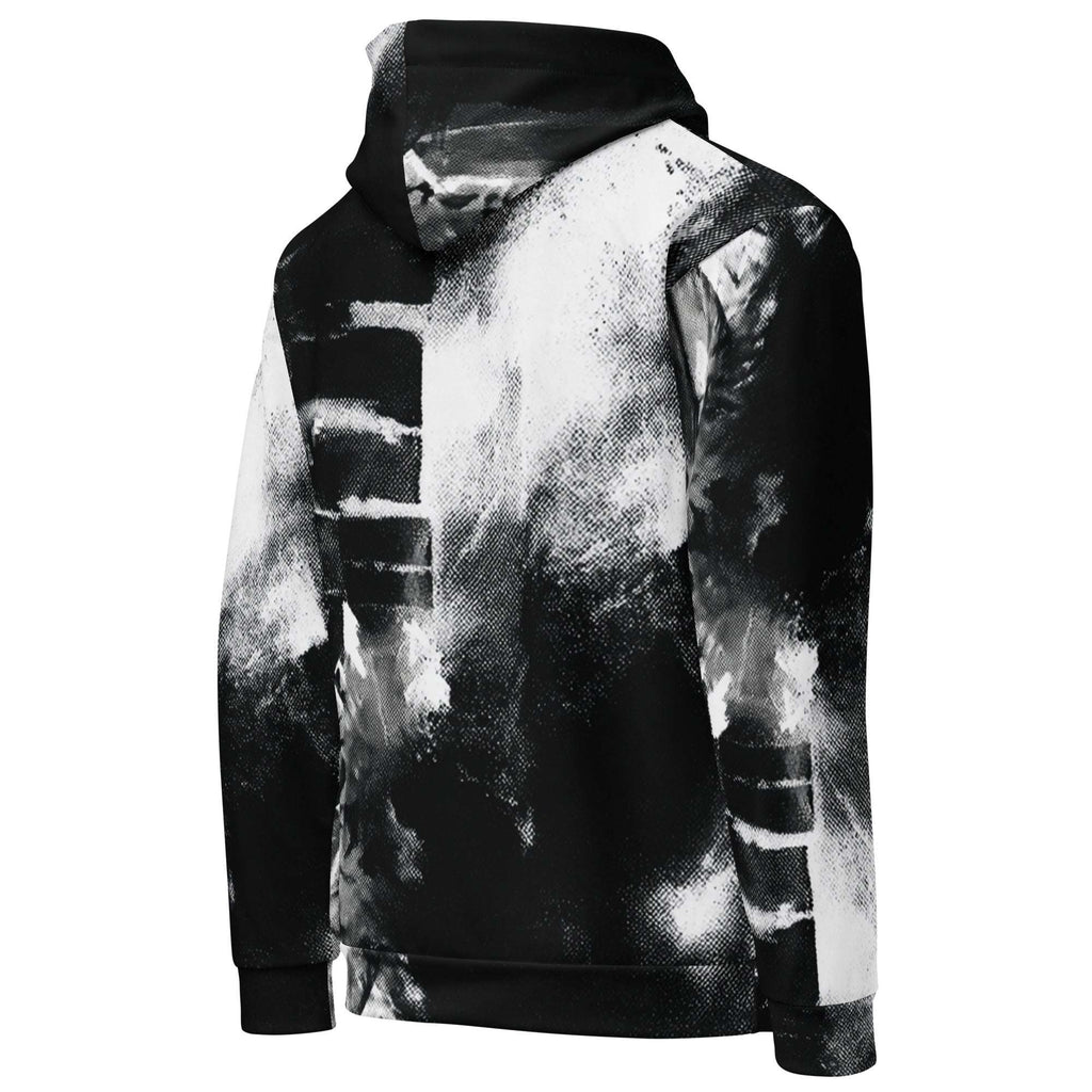 A black and white abstract print hoodie with a distressed, paint-splatter design, shown from a three-quarters angle on a plain white background.