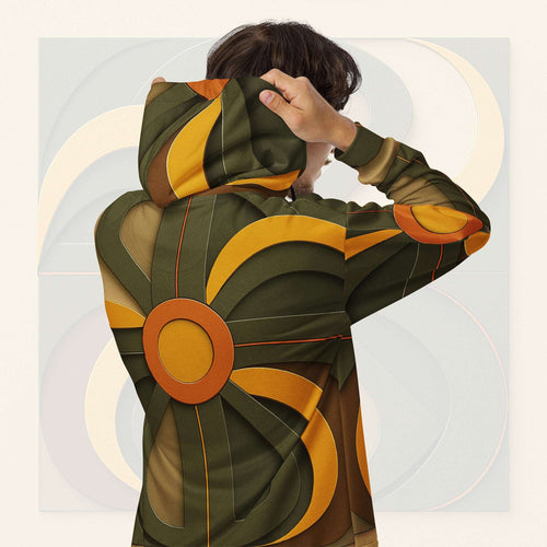 Form Finding Design Men’s Urban Utility Hoodie (No.03) —hoodie’s all-over earth-tone geometric print flowing across back and hood, paired with tan cargo trousers and white trainers, clean studio setting.