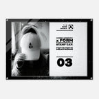 A rectangular acrylic wall art print with rounded corners and visible mounting hardware, featuring a black-and-white split design. The left side shows a monochrome photo of a person wearing a white cap, and the right side contains product text reading 'UNDER ARMOUR x FORM FUNDAMENTALS STAMP CAP' and '03'.
