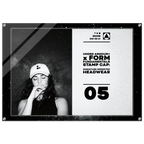 A framed monochrome promotional print or poster featuring a black-and-white portrait of a woman in a cap on the left and text on the right that reads 'UNDER ARMOUR x FORM FUNDAMENTALS STAMP CAP: SIGNATURE IMPRINTED HEADWEAR' with '05' below, shown against a light gray background.