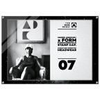 A rectangular black stamp cap plaque featuring a black-and-white photo of a seated woman on the left and printed text on the right, including 'UNDER ARMOUR x FORM FUNDAMENTALS STAMP CAP' and '07'.