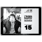 A square promotional display plaque or poster featuring a black-and-white photo of a woman wearing an Under Armour cap and blowing bubble gum, alongside printed text reading 'UNDER ARMOUR x FORM FUNDAMENTALS STAMP CAP: SIGNATURE IMPRINTED HEADWEAR' and the number '15'.