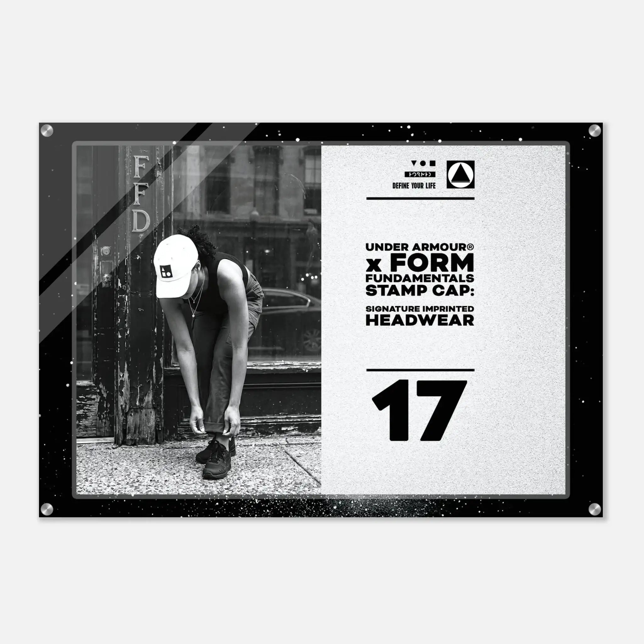 A rectangular Under Armour x Form Fundamentals Stamp Cap graphic print or poster, featuring a black-and-white photo of a person tying shoes on the left and bold text on the right, including 'UNDER ARMOUR x FORM FUNDAMENTALS STAMP CAP' and the number '17'.