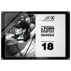 A rectangular acrylic or glass stamp cap plaque featuring a black-and-white photo of a woman wearing a baseball cap on the left, and printed text on the right that reads 'UNDER ARMOUR x FORM FUNDAMENTALS STAMP CAP: SIGNATURE IMPRINTED HEADWEAR' and '18'. The plaque has a black border with corner rivets and is shown against a plain white background.