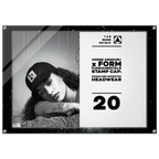 A rectangular acrylic or glass stamp cap plaque featuring a black-and-white photo of a woman wearing a cap on the left and printed text on the right. Visible branding includes Under Armour and Form Fundamentals Stamp Cap, with the number 20 prominently displayed.