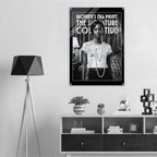 Poster of a woman in a stylish outfit on a wall above a shelf with decor items.