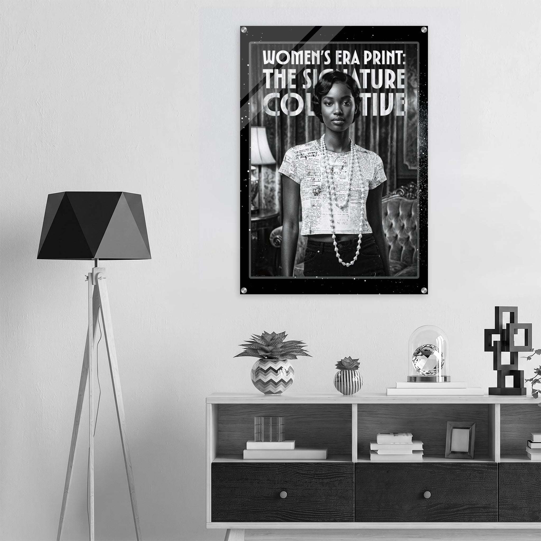 Poster of a woman in a stylish outfit on a wall above a shelf with decor items.