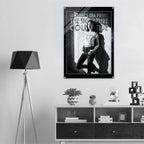 Poster of a woman in a superhero costume on a wall above a shelf with decor items.