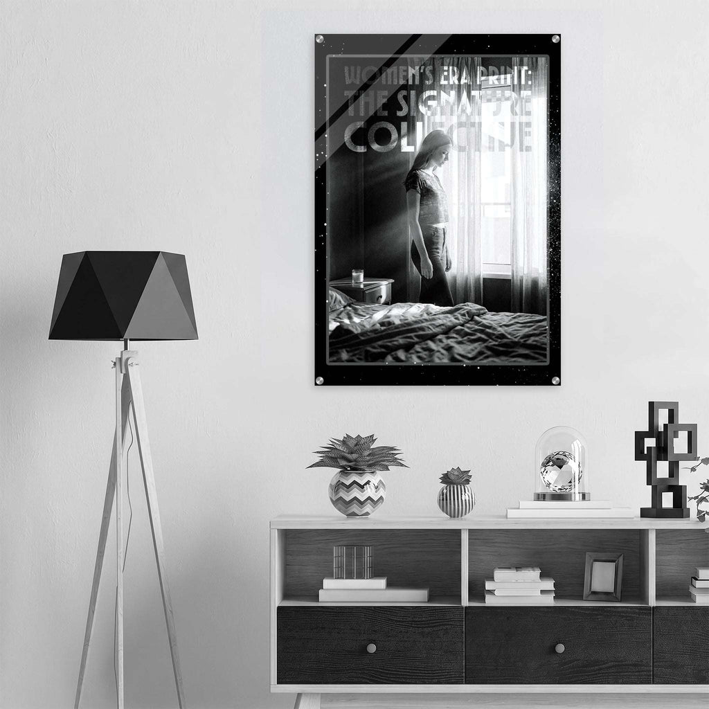 Poster of a woman in a room on a wall above a shelf with decor items.