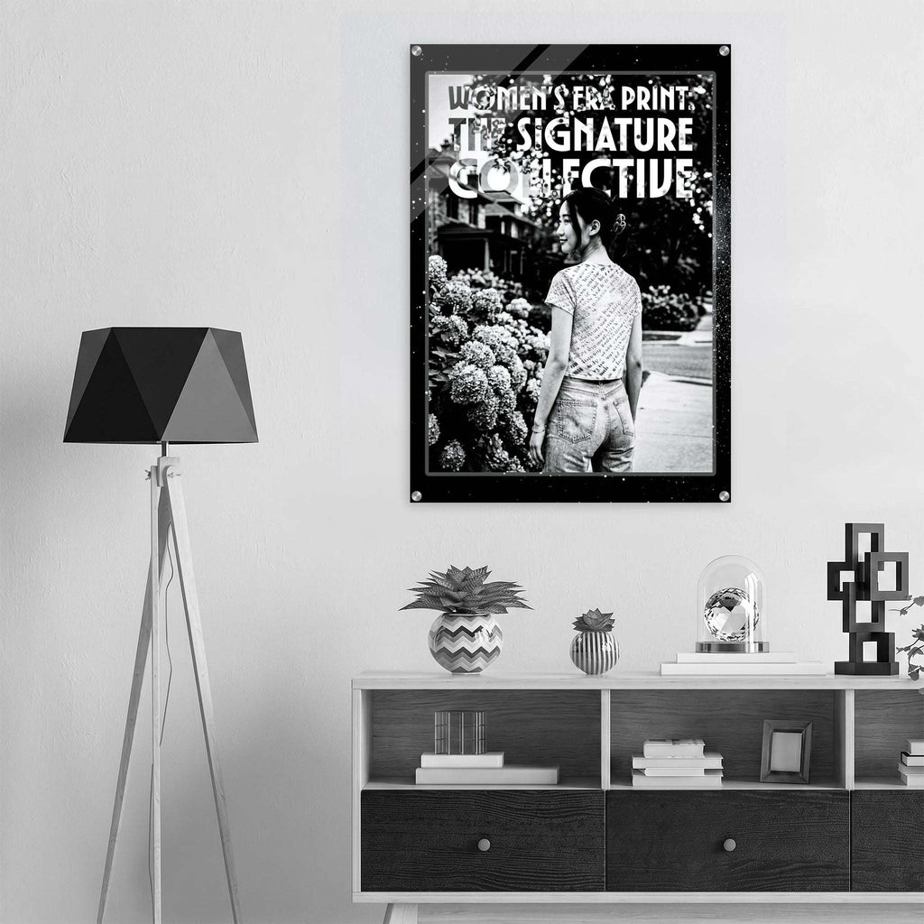 Poster on a wall above a shelf with decorative items