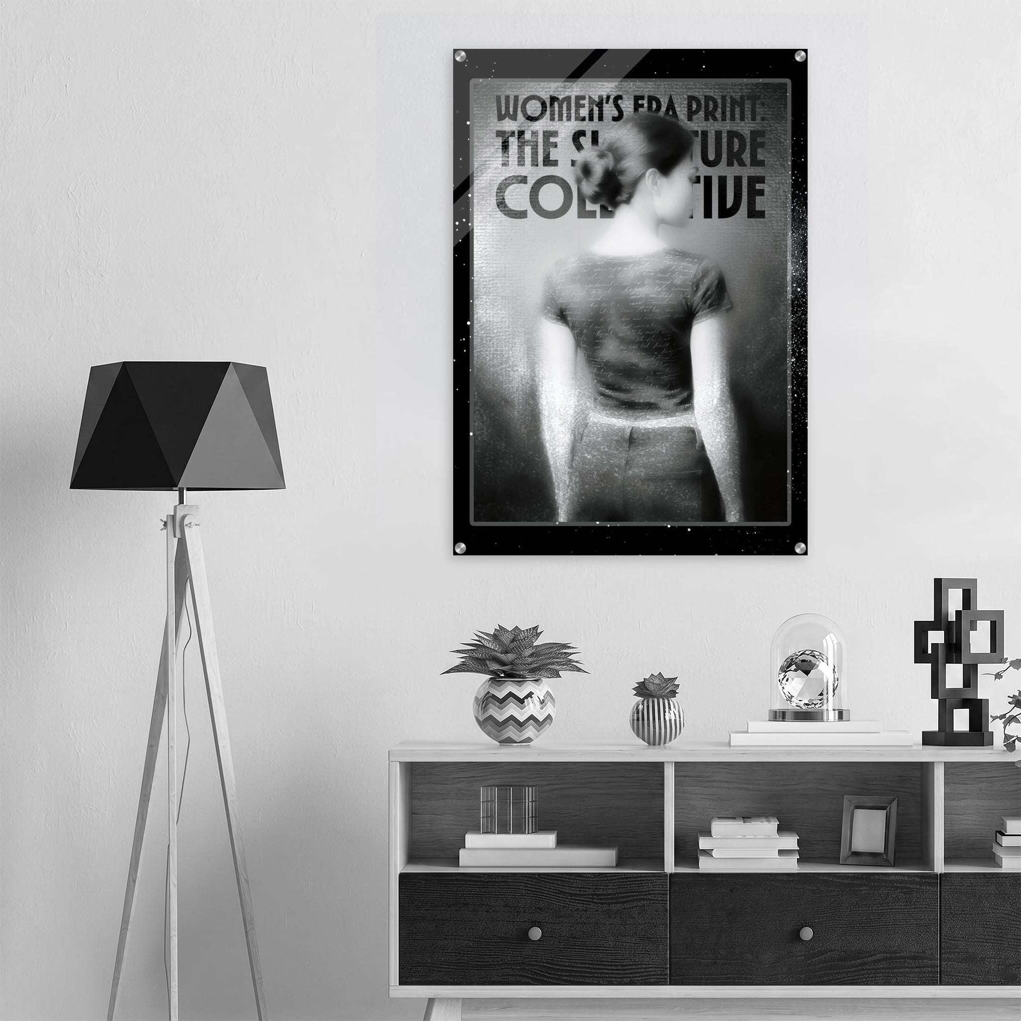 Poster of a woman with text on a wall above a shelf with decorative items.