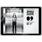 Framed black and white photo of a person in an elevator with branding text on the side.