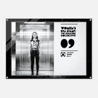 Poster with a woman in an elevator and 'Women's Era Stamp' branding on a white background