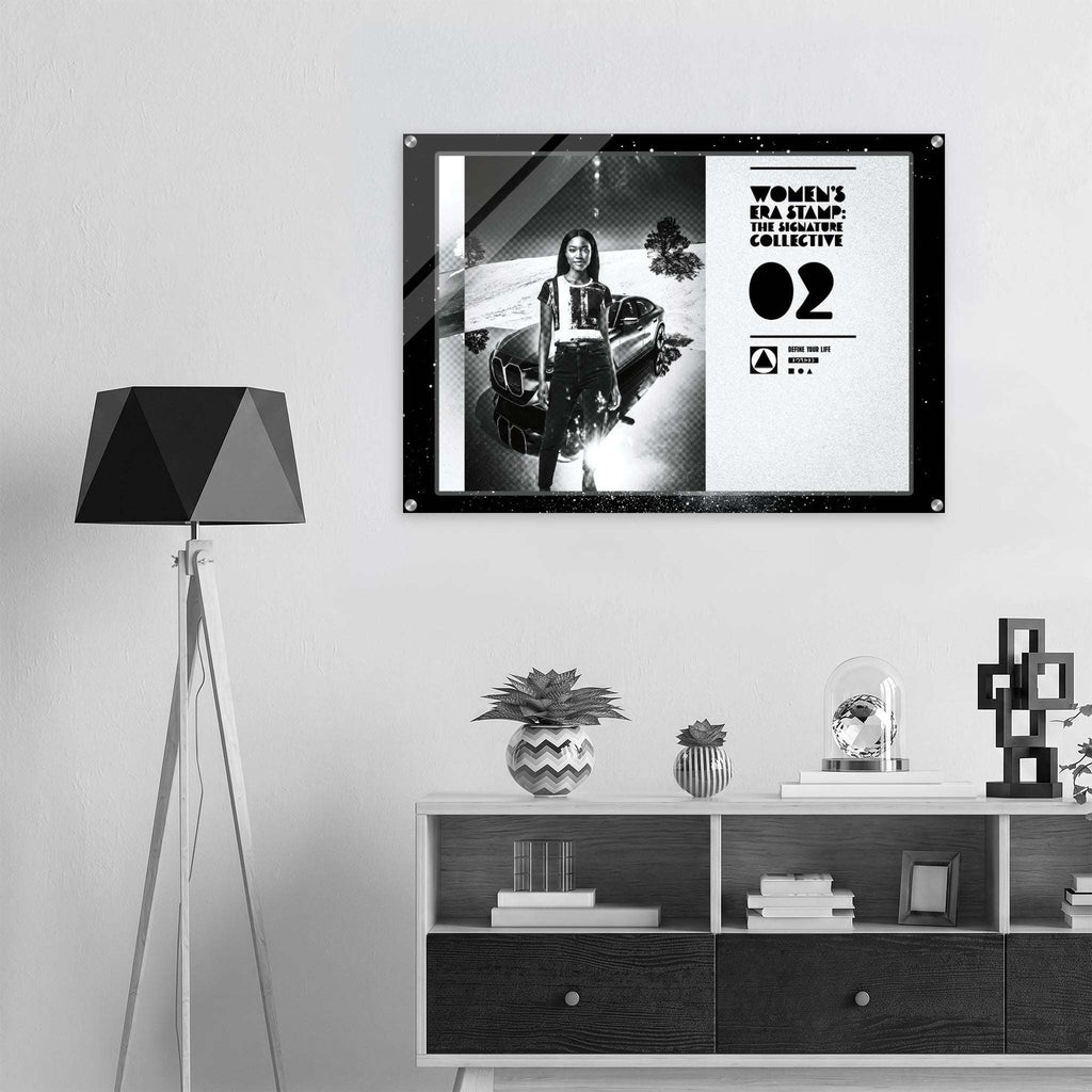 Framed poster on a wall above a shelf with decorative items