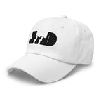 White cap low front-angle view highlighting the negative-space logo patch from Form Finding Design