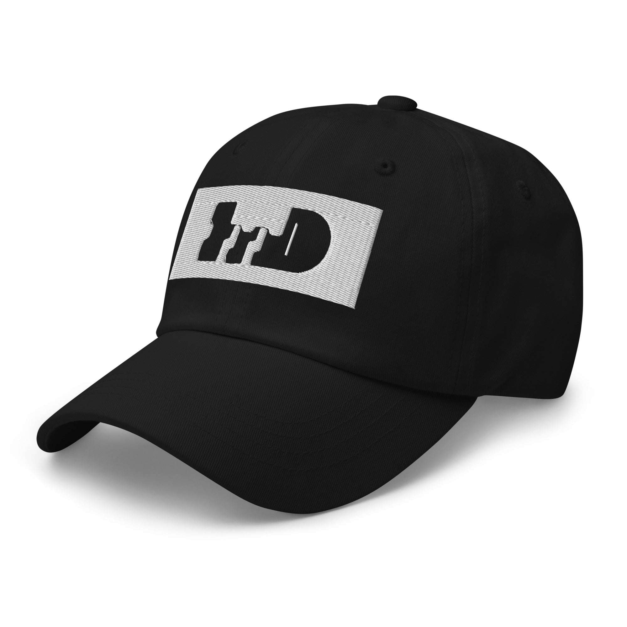 Black cap low front-angle view highlighting the negative-space logo patch from Form Finding Design