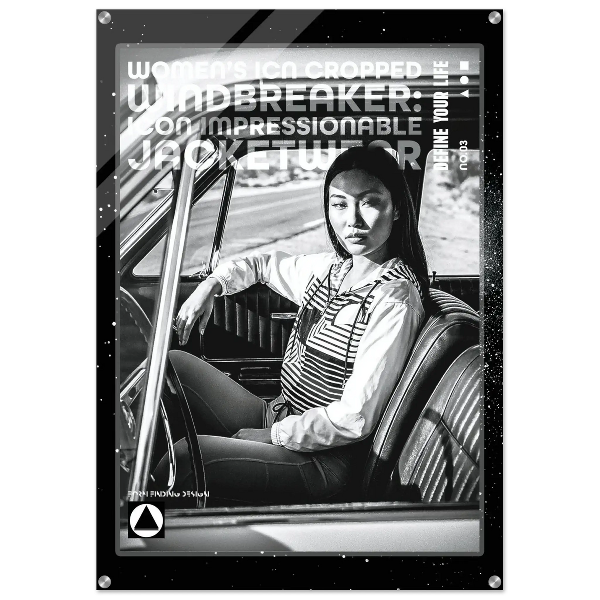 A black and white fashion poster or print featuring a seated woman in a car interior, with large overlaid text reading 'WOMEN'S ICON CROPPED WINDBREAKER: IMPRESSIONABLE JACKETWEAR'. The poster has a dark border and is shown against a light neutral background.
