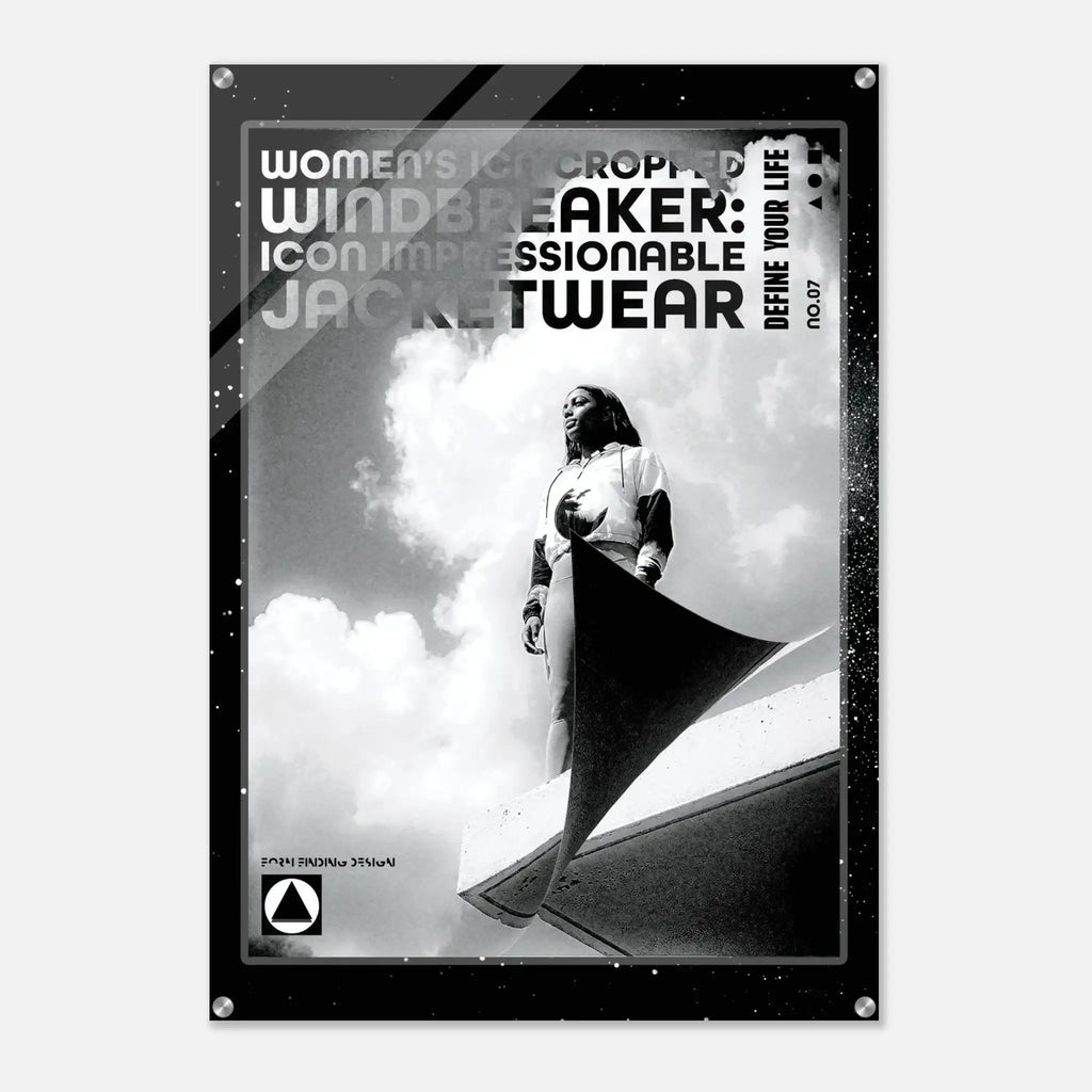 A black and white fashion poster featuring a model wearing a windbreaker jacket, with bold text reading 'WOMEN'S ICON CROPPED WINDBREAKER: ICON IMPRESSIONABLE JACKETWEAR' and 'DEFINE YOUR LIFE'.
