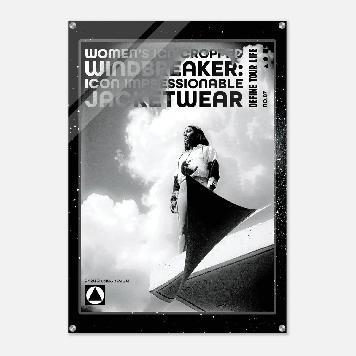 A black and white fashion poster featuring a model wearing a windbreaker jacket, with bold text reading 'WOMEN'S ICON CROPPED WINDBREAKER: ICON IMPRESSIONABLE JACKETWEAR' and 'DEFINE YOUR LIFE'.