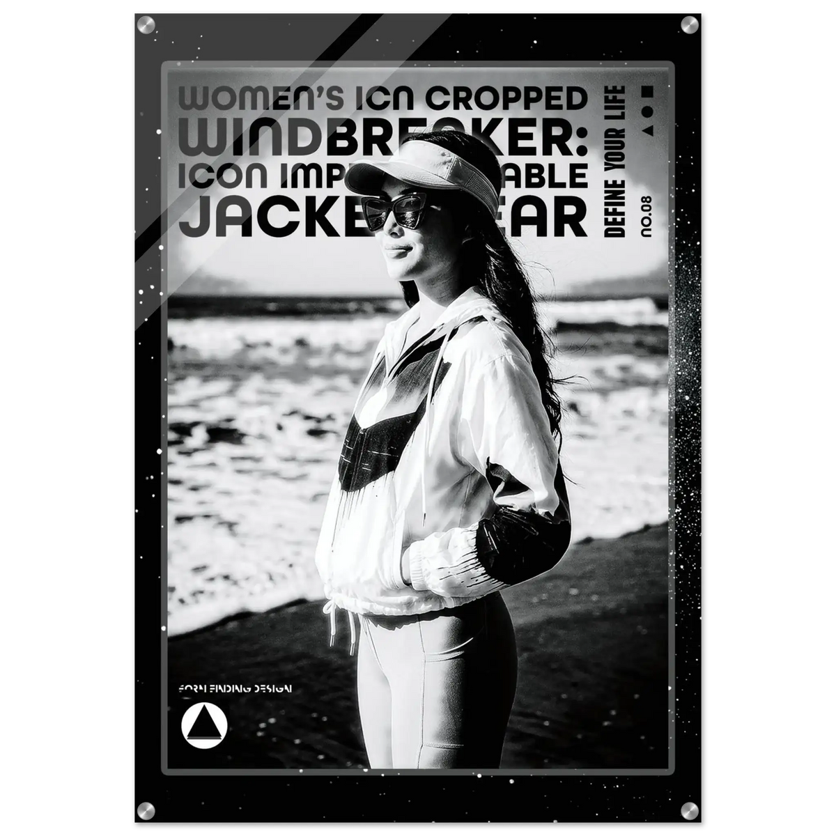 A black and white fashion poster featuring a woman wearing a windbreaker jacket and cap on a beach, surrounded by a distressed black frame with text including 'WOMEN'S ICON CROPPED WINDBREAKER ICON IMPRESSIONABLE JACKETWEAR' and 'DEFINE YOUR LIFE'.