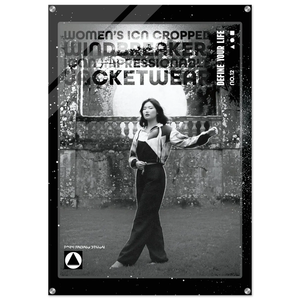 A black and white fashion poster or print featuring a woman standing outdoors in front of a stone wall, wearing a cropped jacket and wide-leg pants. Large distressed text across the top reads 'WOMEN'S CROPPED WINDbreaker JACKETWEAR' with smaller text including 'DEFINE YOUR LIFE'.