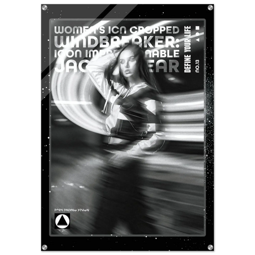 A black and white graphic poster or print featuring a stylized woman with motion-blur effects and bold text reading 'WOMEN'S ICON CROPPED WINDBREAKER' and 'DEFINE YOUR LIFE'. The design is monochrome with a dark border and small white speckles, shown against a light gray background.