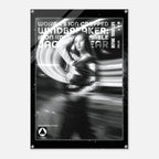 A black and white fashion poster featuring a woman in motion with dramatic light streaks, surrounded by a black border with text including 'WOMEN'S ICON CROPPED WINDBREAKER: ICON IMPRESSIONABLE JACKETWEAR' and 'DEFINE YOUR LIFE NO.13'.