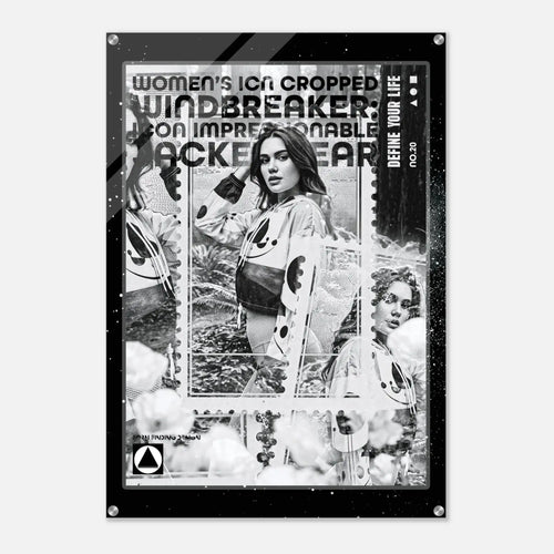 A black-framed art print or poster featuring a monochrome collage with fashion imagery, distressed text, and a central woman in a white jacket, shown against a light gray background.