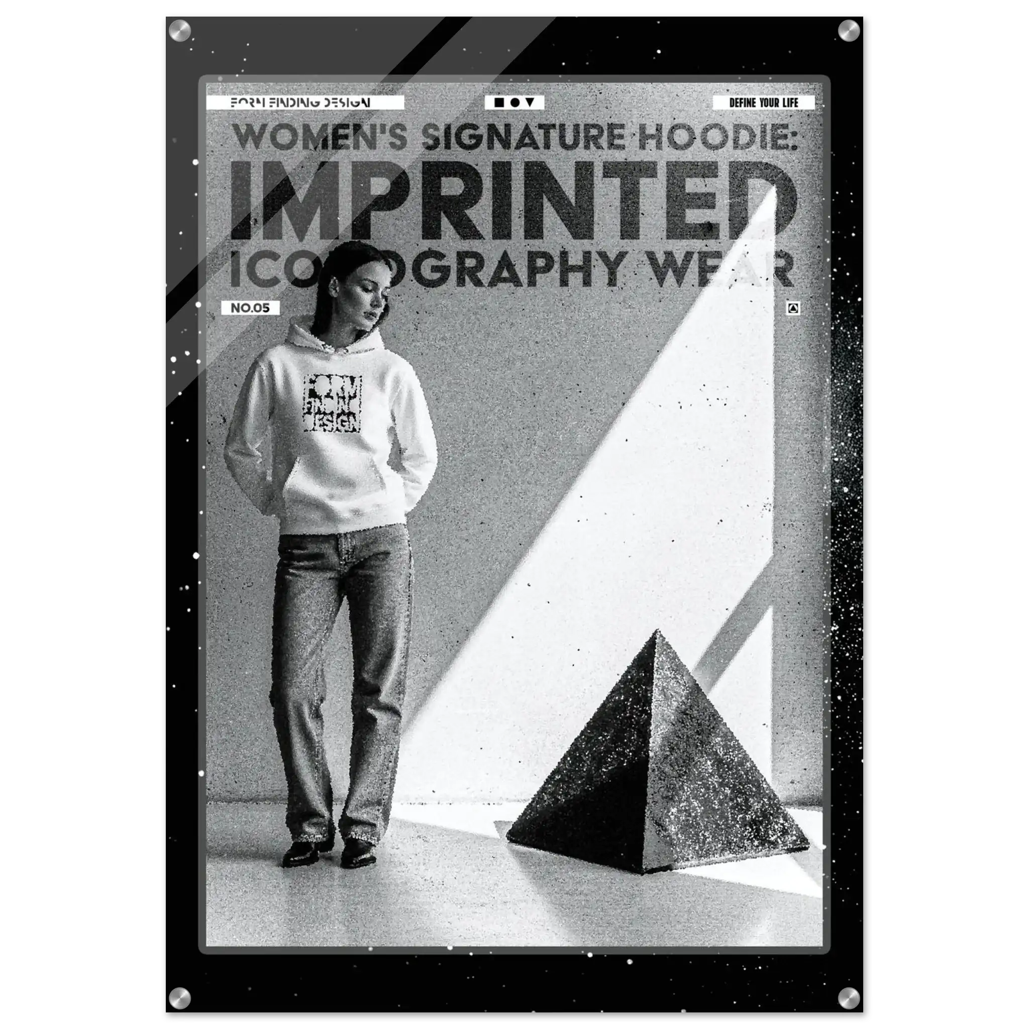 A black and white fashion poster-style product image for a women's signature hoodie. A person stands wearing a light hoodie with a graphic print and jeans, beside a large geometric pyramid shape.