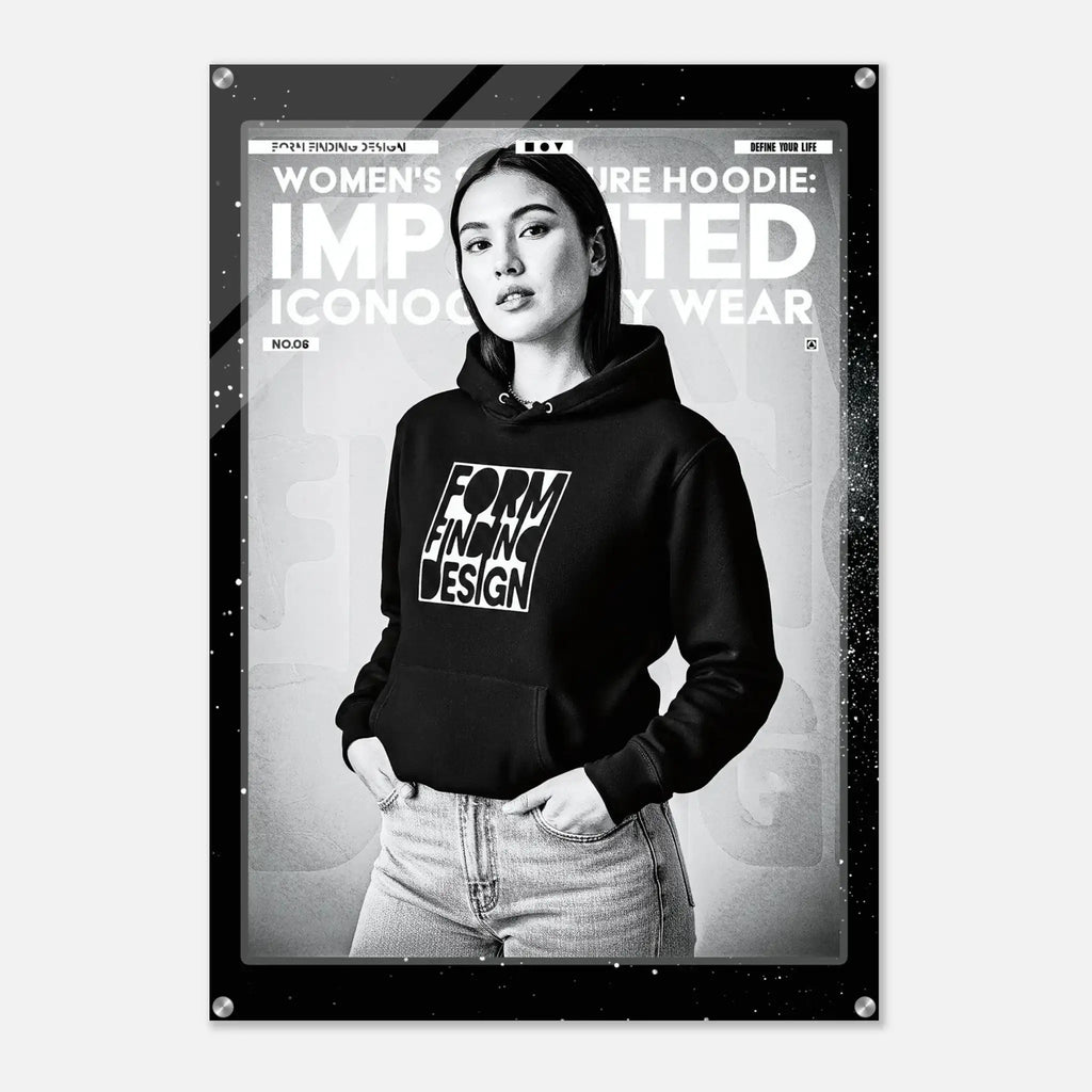A black and white fashion poster featuring a model wearing a black hoodie with the text 'FORM FINDING DESIGN' on the front. The poster includes the text 'WOMEN'S SIGNATURE HOODIE: IMPRINTED ICONOGRAPHY WEAR' and is displayed on a light gray background with a subtle drop shadow.