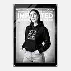 A black and white fashion poster featuring a model wearing a black hoodie with the text 'FORM FINDING DESIGN' on the front. The poster includes the text 'WOMEN'S SIGNATURE HOODIE: IMPRINTED ICONOGRAPHY WEAR' and is displayed on a light gray background with a subtle drop shadow.