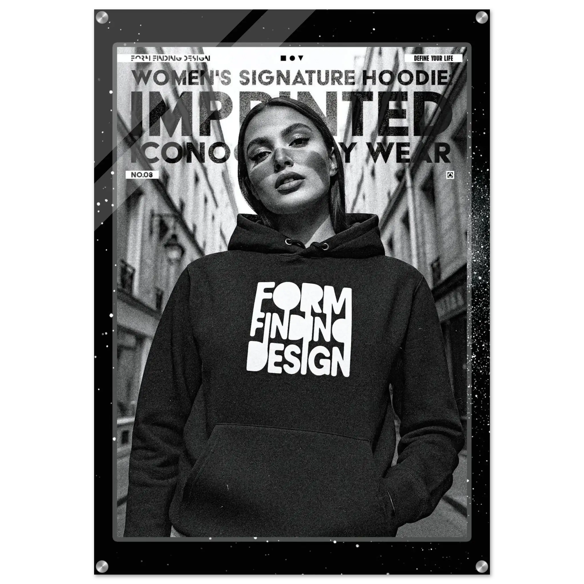 A black graphic hoodie with the words 'FORM FINDING DESIGN' printed in white on the front, worn by a model in a black-and-white street scene. The image is presented as a framed poster-style product shot with text reading 'WOMEN'S SIGNATURE HOODIE IMPRINTED ICONOGRAPHY WEAR'.