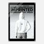 A black poster-style print featuring a grayscale photo of a person from behind wearing a white hoodie and jeans, with bold text reading 'WOMEN'S SIGNATURE HOODIE: IMPRINTED ICONOGRAPHY WEAR' and 'NO.13'.