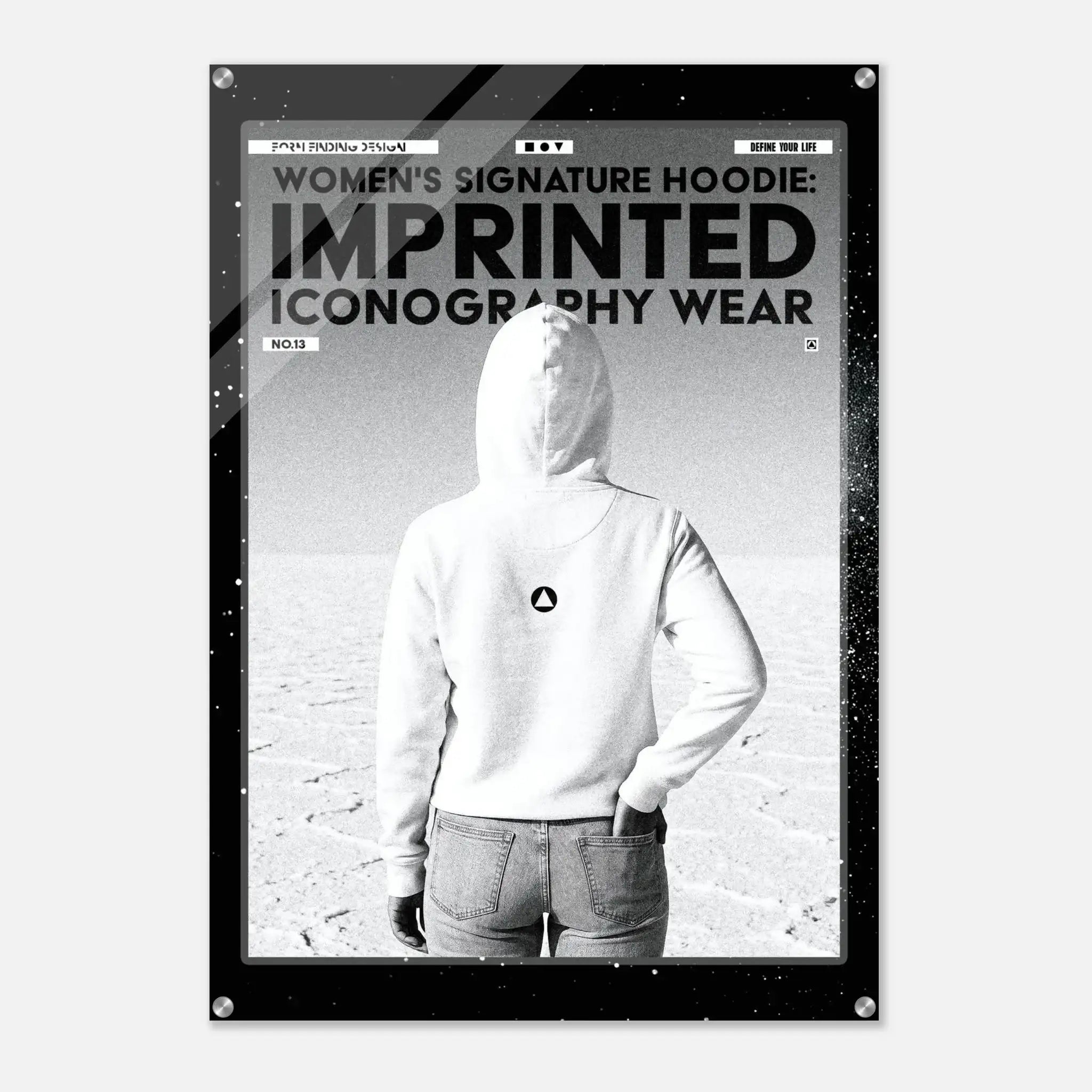 A black poster-style print featuring a grayscale photo of a person from behind wearing a white hoodie and jeans, with bold text reading 'WOMEN'S SIGNATURE HOODIE: IMPRINTED ICONOGRAPHY WEAR' and 'NO.13'.