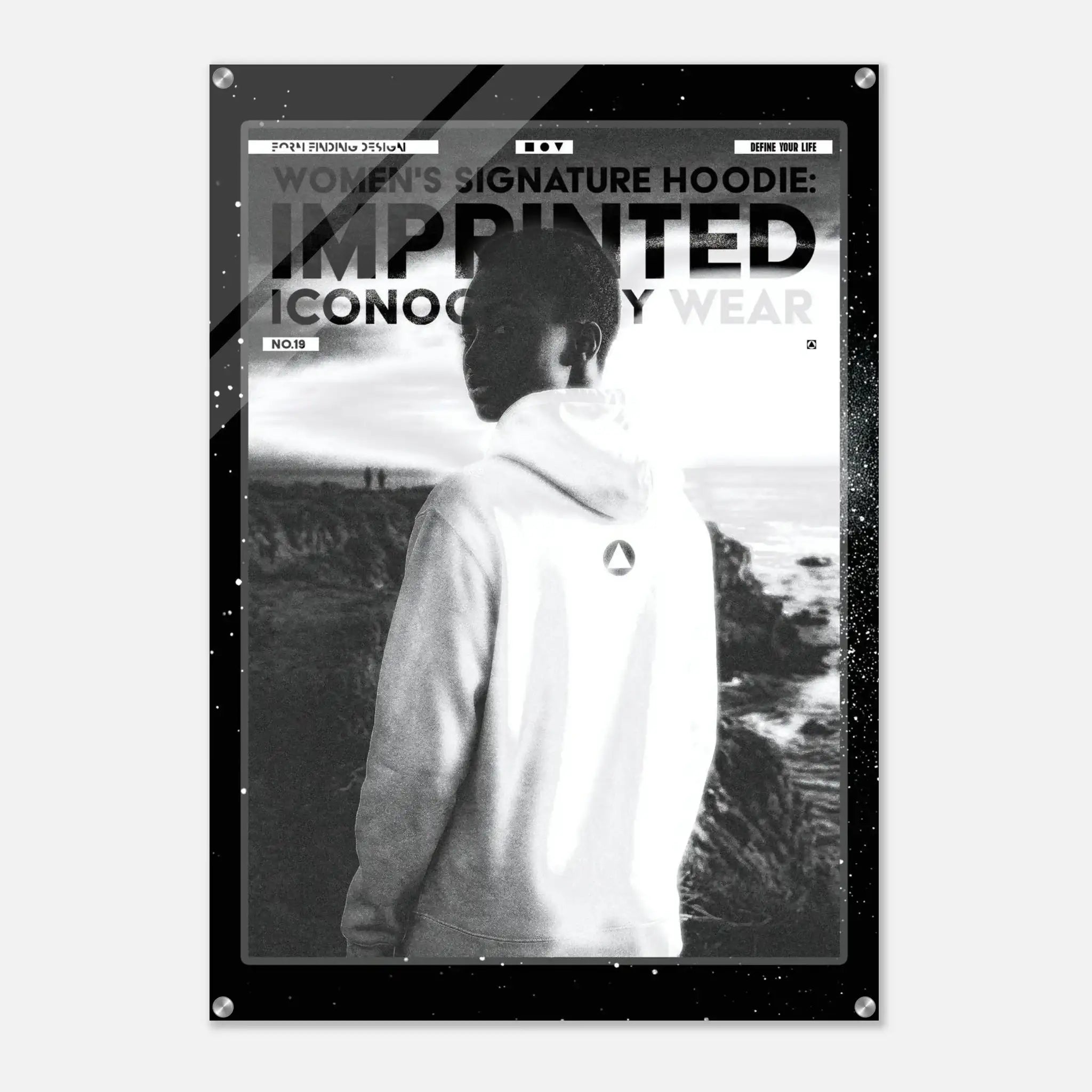 A black and white fashion poster featuring a model from behind wearing a hoodie, with bold text reading 'WOMEN'S SIGNATURE HOODIE: IMPRINTED ICONOGRAPHY WEAR' and 'NO.19'.