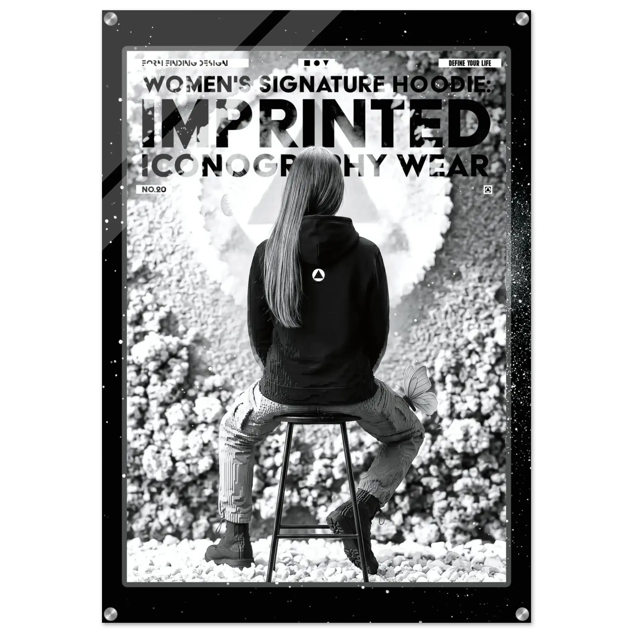 A black and white fashion poster featuring a seated woman from behind wearing a hoodie, with large text reading 'WOMEN'S SIGNATURE HOODIE IMPRINTED ICONOGRAPHY WEAR' and 'NO. 20'.