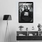A black and white fashion poster hanging on a light gray wall above a white and dark wood console shelf. The poster features a woman wearing a hoodie with the text 'FORM FINDING DESIGN' and 'WOMEN'S SIGNATURE HOODIE'.