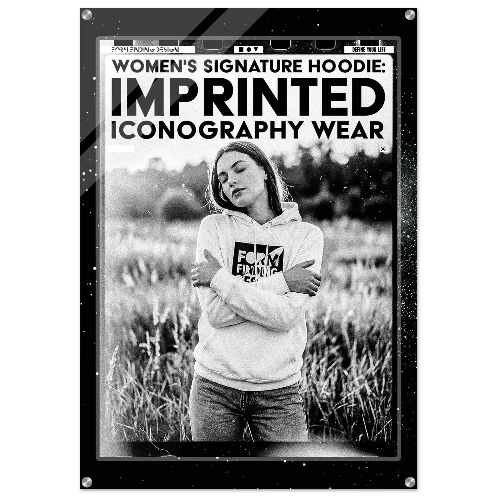 A black graphic hoodie with bold white text reading 'WOMEN'S SIGNATURE HOODIE: IMPRINTED ICONOGRAPHY WEAR' and a black-and-white photo of a woman wearing it, shown against a white background.