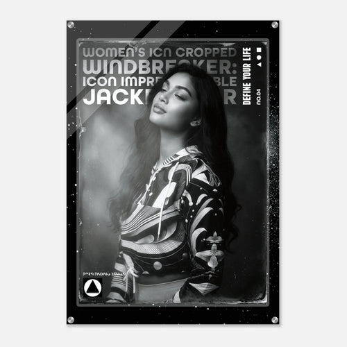 A black and white poster print featuring a portrait of a woman in a patterned jacket, with bold text reading 'WOMEN'S ICON CROPPED WINDBREAKER: ICON IMPRESSIONABLE JACKETWEAR' and 'DEFINE YOUR LIFE'.