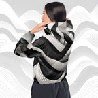 Model wearing white colourway ICN Cropped Windbreaker No.02—three-quarter back pose highlighting hood and wraparound striped graphic, cropped hem with adjustable drawcord from Form Finding Design.